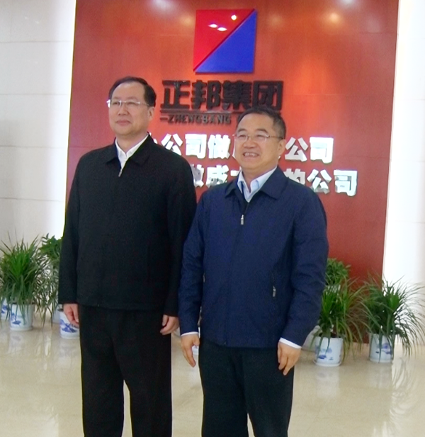 21.江西省委常委、常务副省长毛伟明与林印孙总裁亲切合影.png